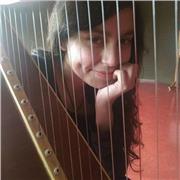 Profesora de Música: charango, arpa, guitarra, bajo