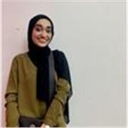 Friendly maths tutor helping students achieve academic success