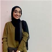 Friendly maths tutor helping students achieve academic success