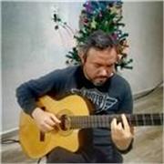 profesor internacional de guitarra clasica ,electrica , piano y canto