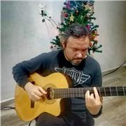 profesor internacional de guitarra clasica ,electrica , piano y canto