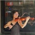 Músico con experiencia orquestal y práctica impartiendo clases de violin y guitarra en nivel de iniciación