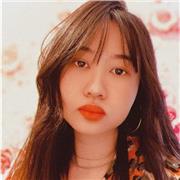 Vietnamese tutor providing lessons to children