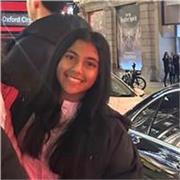 high-achieving, results-orientated tutor helping students turn dedication into outstanding results