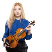 Academic violin professor and performer who can provide lessons for beginners and intermediate students.