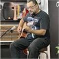 Profesor de música (guitarra). método de aprendizaje basado en repertorio. 
nivel básico: acordes, ritmos, etc 