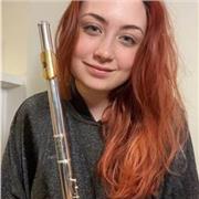 National award winning flautist of 15 years of experience gives flute lessons