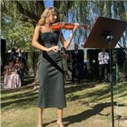 Profesora de música y de violín con título de conservatorio