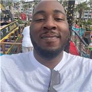 A Football coach teaches players of all ages