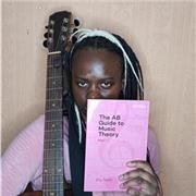 Music teacher providing (guitar, song writing or singing) lessons at all ages from beginner to intermediate level