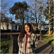 Psychology post graduate student providing psychology classes to undergraduate and high school level students