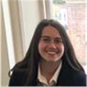 Medical student providing science lessons for GCSE students