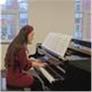 Experienced piano teacher with 8+ years' teaching and 20 years' playing, offering online lessons for children and adults worldwide