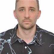 A funny, reliable teacher helps students improve their English with the passion.