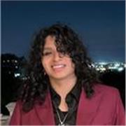 A native speaker, fluent in English and Spanish.