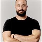 I would describe myself as a versatile and client-focused personal trainer with a strong background in Pilates, powerlifting