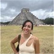 Spanish tutor providing lesson to children and adults