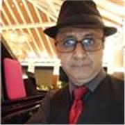 Profesor de música (solfeo, teoría, adiestramiento auditivo) y en los instrumentos de piano y saxofón