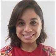 Spanish tutor delivering lesson to children and adults