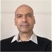 I am a native Spanish speaker with extensive educational experience, and I would be glad to help you with your conversation skills