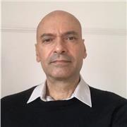 I am a native Spanish speaker with extensive educational experience, and I would be glad to help you with your conversation skills