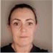 English Teacher conducting classes for Primary school students