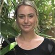 Friendly and supportive ESL tutor helping children being comfortable using English as a foreign language