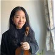Violin tutor providing lessons to specifically children and young musicians