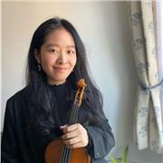 Violin tutor providing lessons to specifically children and young musicians