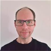 I'm an experienced computer scientist and educator with over 30 years of programming and database expertise.