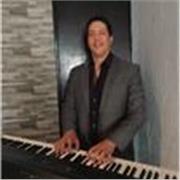 Profesor de Piano, Teoría, Solfeo, Producción Musical y Práctica de Conjunto