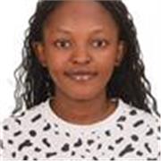 An English teacher conducting classes for both young and adults