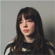 Grade 8 vocalist offering supportive singing lessons for students of all levels, focusing on technique and confidence