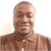 Maths teacher providing assistance to children of age 10 to 12
