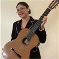 Profesora de guitarra con 30 años de experiencia, apta para dar clases a todas las edades. a domicilio en el area de tarragona.