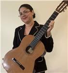 Profesora de Guitarra con 30 años de experiencia, apta para dar clases a todas las edades. A domicilio en el area de Tarragona.