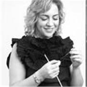 I am a professional fashion designer, textile artist, and creative director specializing in sustainable fashion, avant-garde 