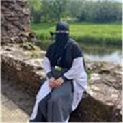 Portuguese teacher providing lesson to people of all age