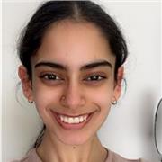 University student tutoring students between ages of 11-16