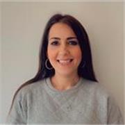 Multilingual English teacher helping young adults gain confidence