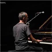 Inizia lo studio del pianoforte all'età di 7 anni grazie al nonno libanese, grande studioso e appassionato di musica. 
Oltre al pianoforte classico mostra sin da giovanissimo una grande curiosità verso il piano jazz e l'improvvisazione, e all'età di 16 a