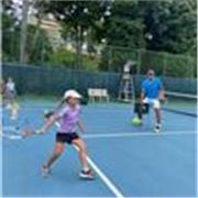 Profesor de tenis para niños y adultos iniciantes, intermedio y avanzado