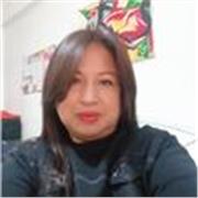 Soy una niña mas del grupo dando clases a niños más pequeños.