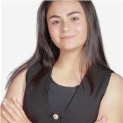 Experienced English tutor helping children improve their language skills