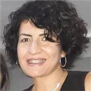 Insegnante di Economia Aziendale a studenti di scuola superiore e universitari