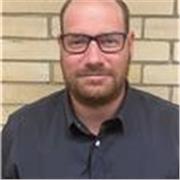 An experienced higher education business studies lecturer and tutor 