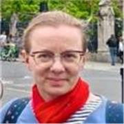 Supportive mentor helping students build confidence and focus