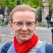 Supportive mentor helping students build confidence and focus.