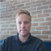 Friendly English Teacher with extensive experience in local government and higher education