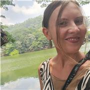 A linguist passionate about languages tailoring lessons for adults to improve their level and love English